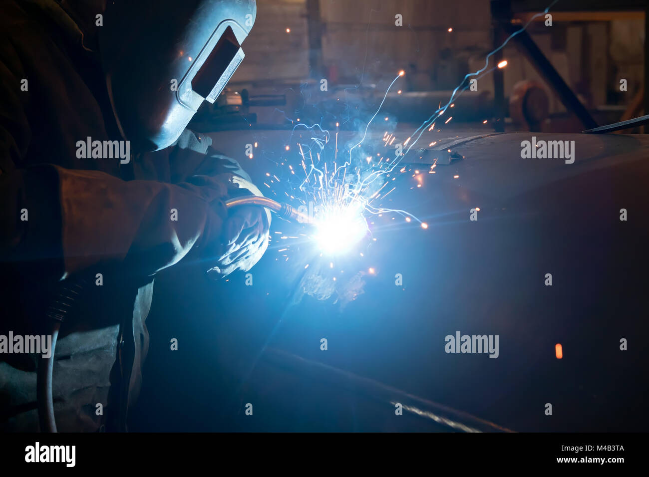 Repair of parts of the apparatus for manual arc welding Stock Photo