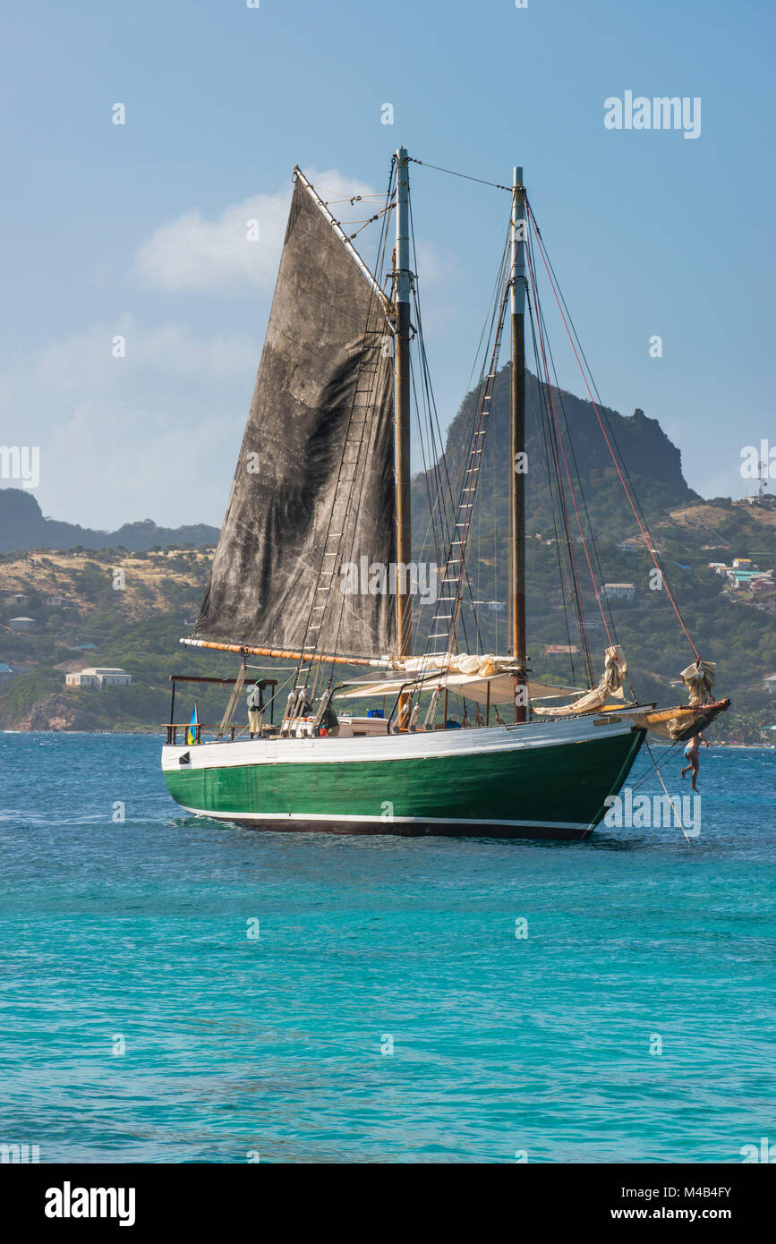 Historic Scaramouche sailing boat featured in Priates of the Caribbean,Palm island,Grenadines islands,St. Vincent and the Grenadines,Caribbean Stock Photo