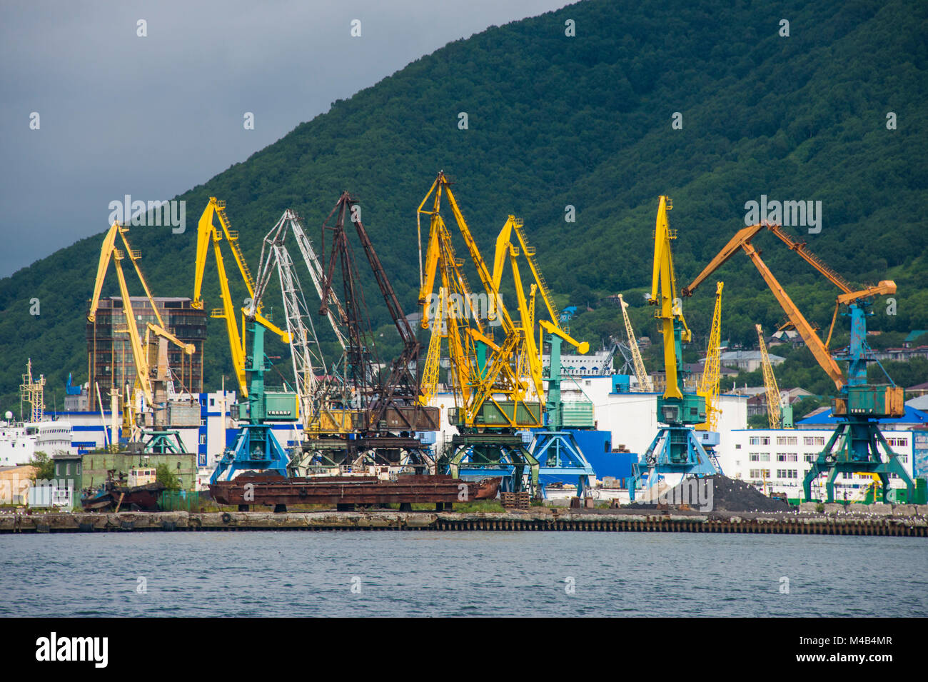 Loading cranes in the habour of Petropavlovsk-Kamchatsky,Kamchatka,Russia Stock Photo