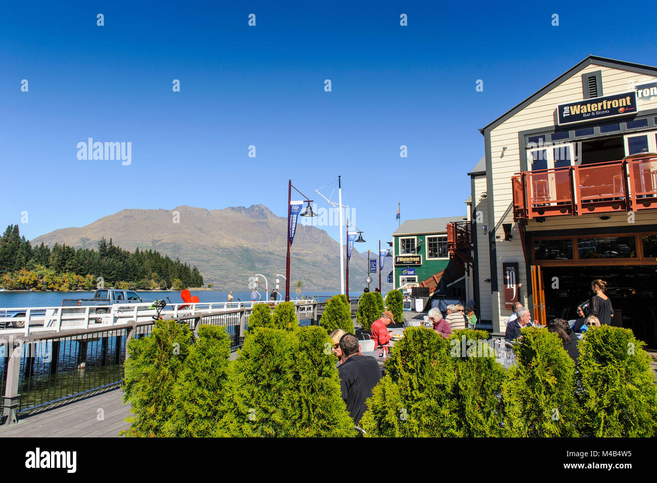 Open air cafe on the shore of lake wakatipu,Queenstown,South Island,New Zealand Stock Photo