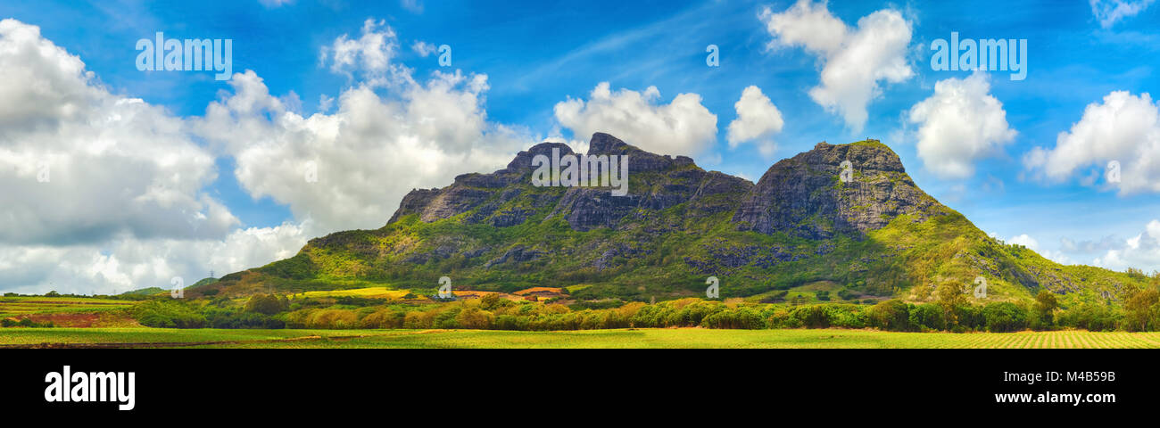 View of a lake and mountains. Mauritius. Panorama Stock Photo