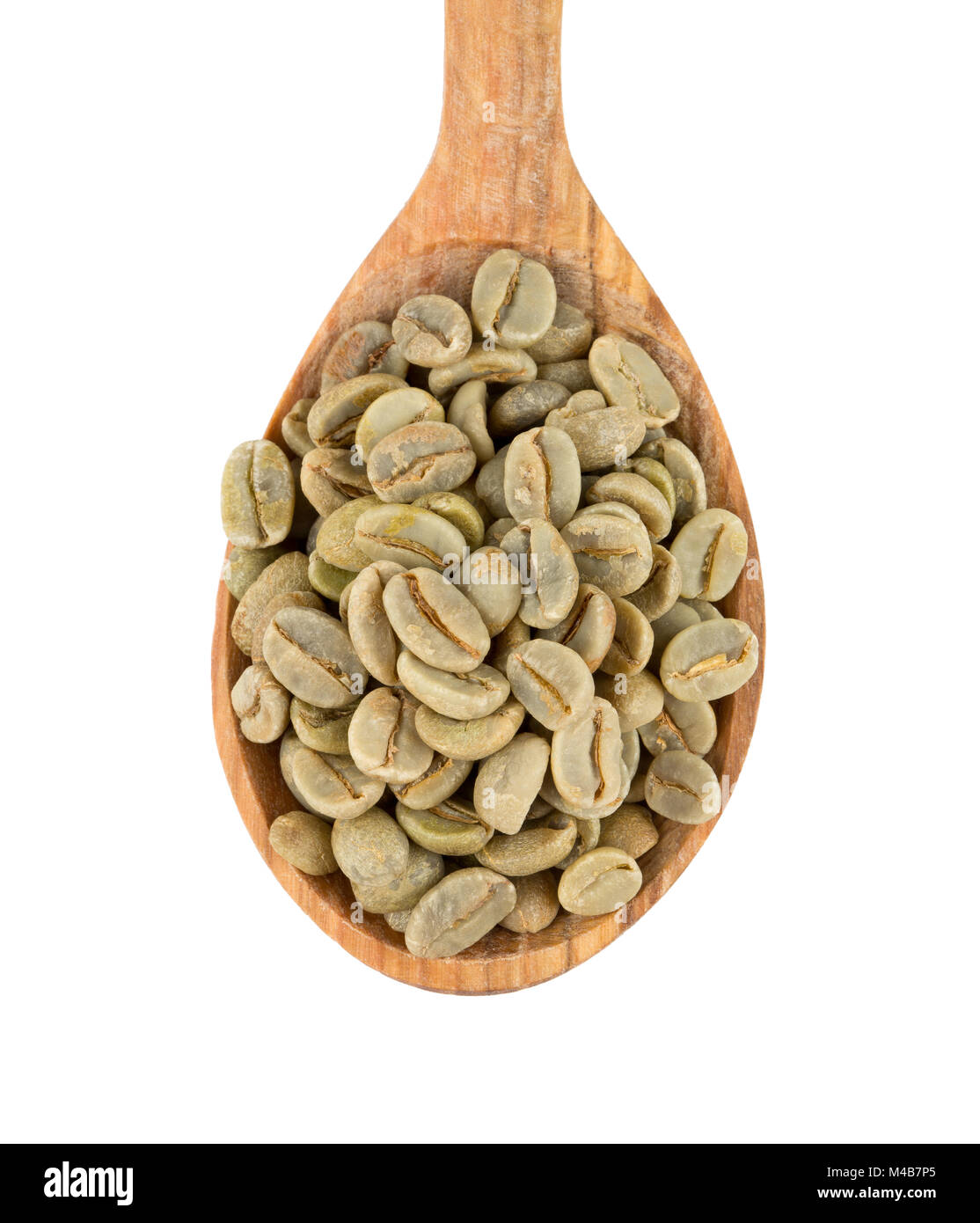 green coffee beans in a wooden spoon Stock Photo