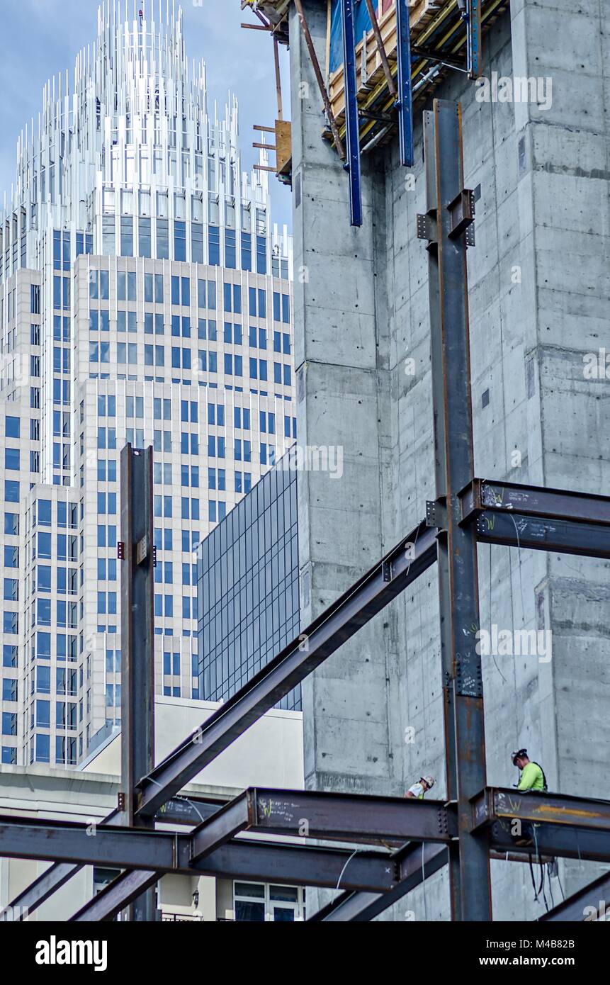 construction worker working on highrise building Stock Photo