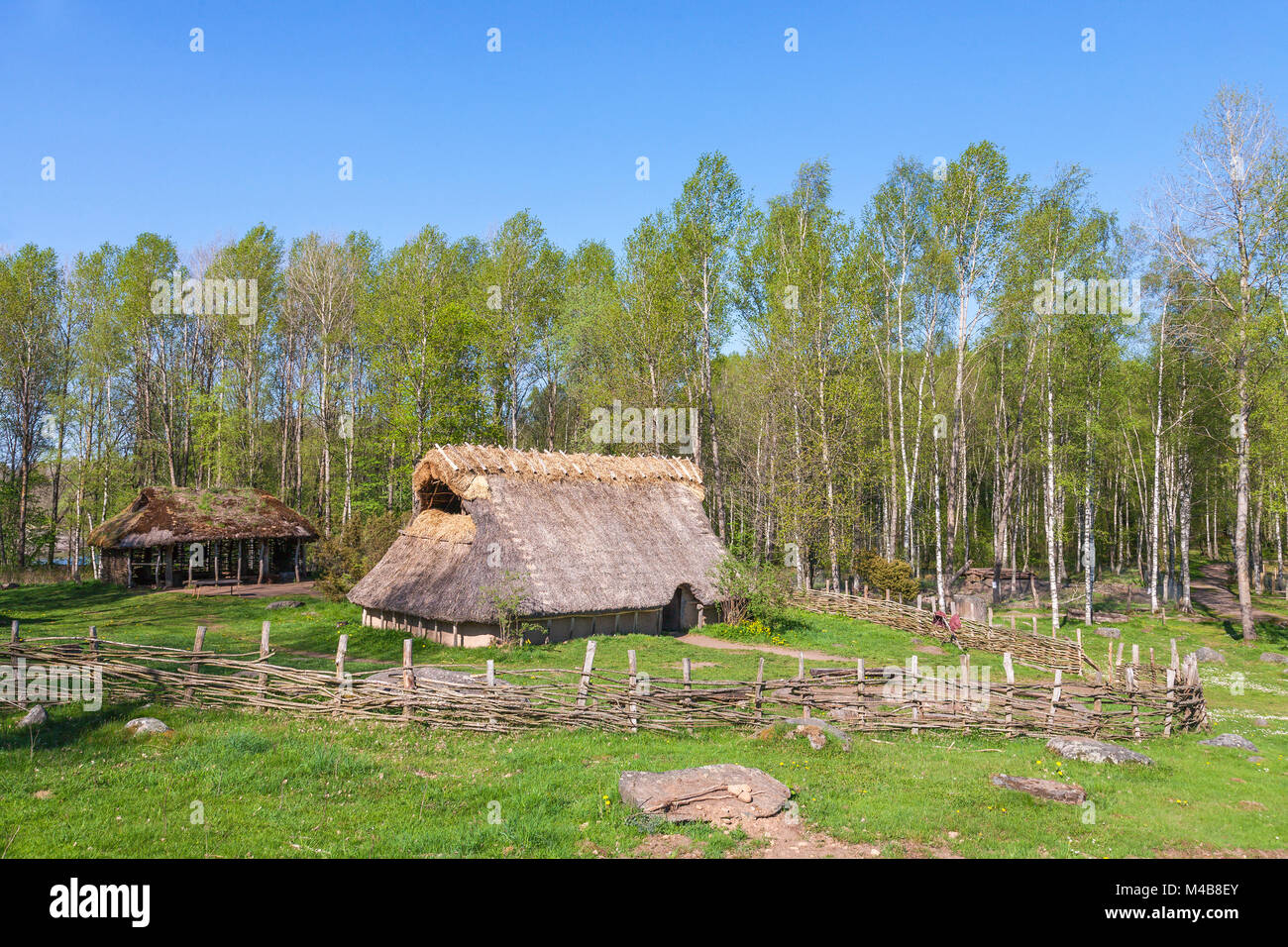 Bronze Age's hut at a forest Stock Photo
