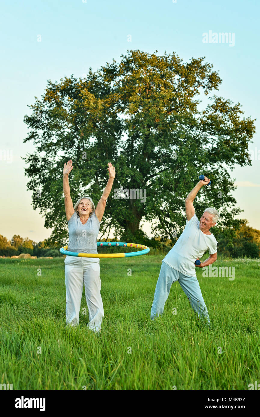 senior couple doing exercises Stock Photo - Alamy