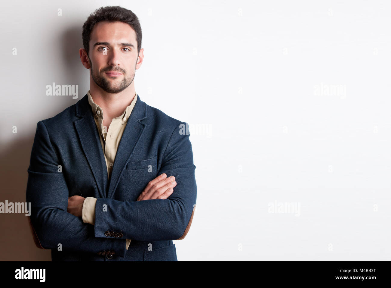 Portrait of a Man With his arms crossed Stock Photo