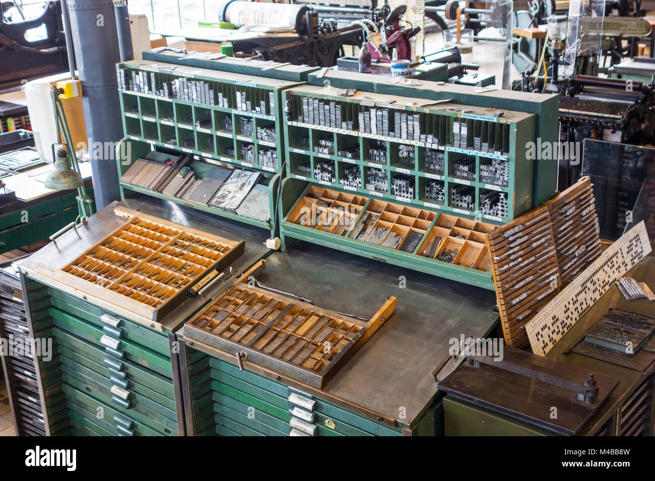 Type case in composing room at printing business, technology for mechanical typesetting text in letterpress printing Stock Photo