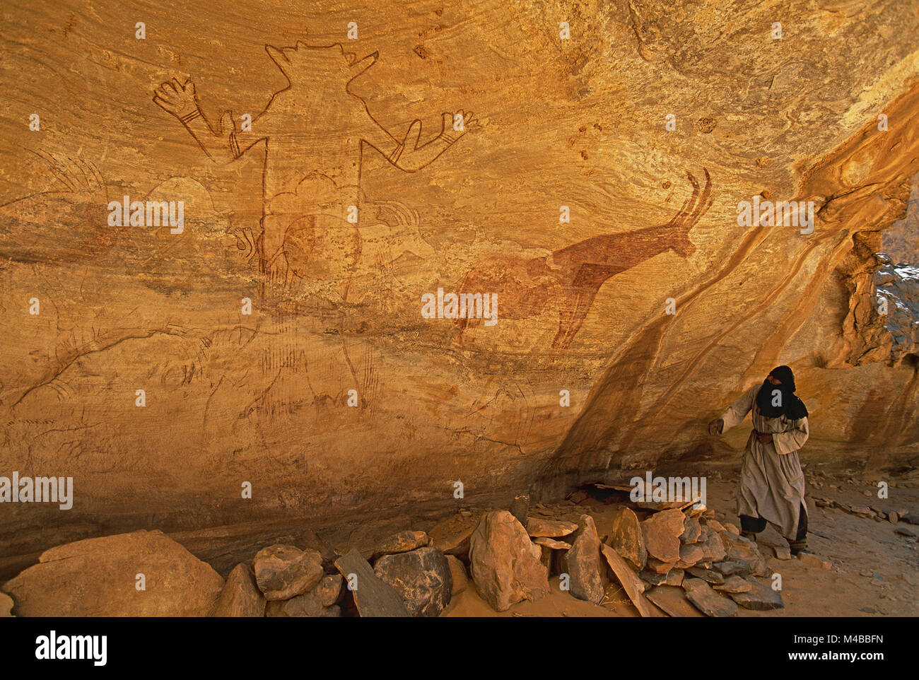 Algeria, Djanet. National Park Tassili n'Ajjer. UNESCO World Heritage site. Prehistoric rockpaintings. The Great Figure of Sefar. Stock Photo
