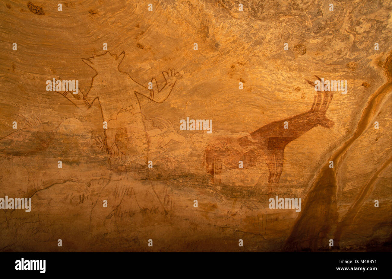 Algeria, Djanet. National Park Tassili n'Ajjer. UNESCO World Heritage site. Prehistoric rockpainting. 'The God of Sefar'. Sahara desert. Stock Photo