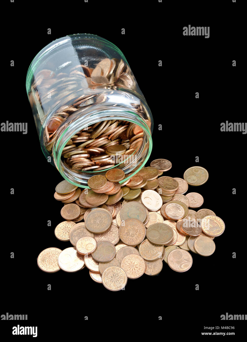 jam jar with poured out Eurocent coins Stock Photo