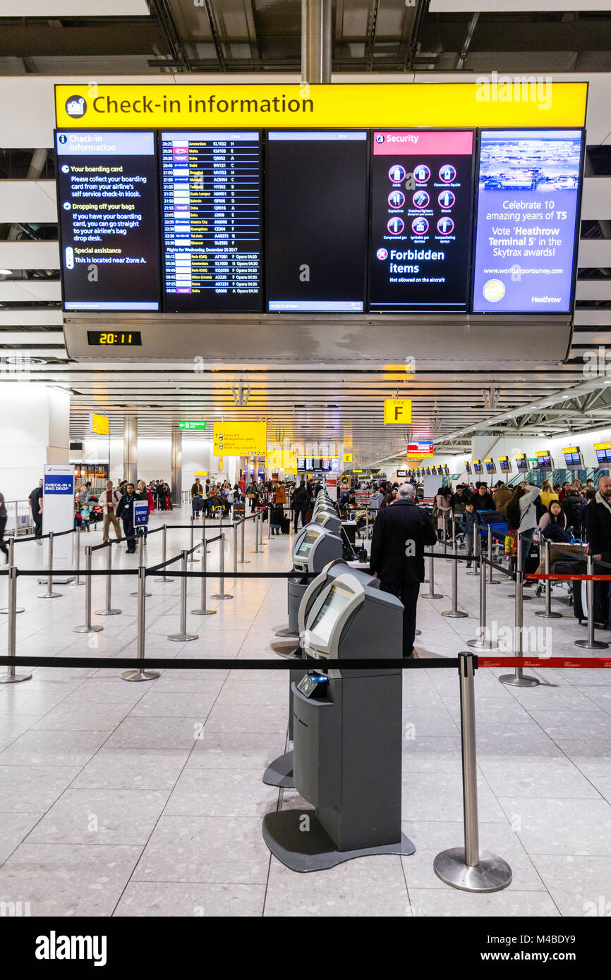 England, Heathrow terminal four. People queuing at the International