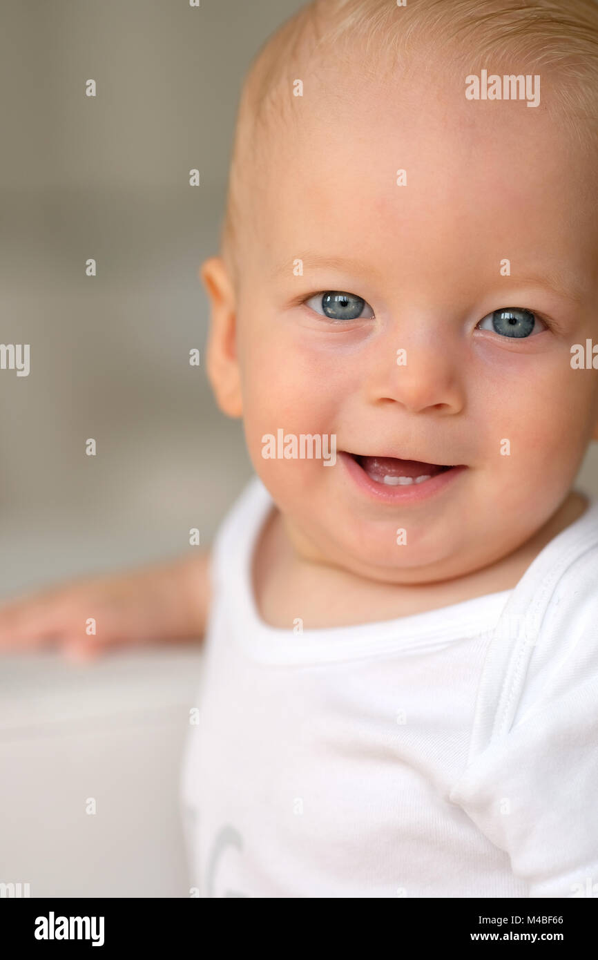 Baby boy with blue eyes Stock Photo Alamy