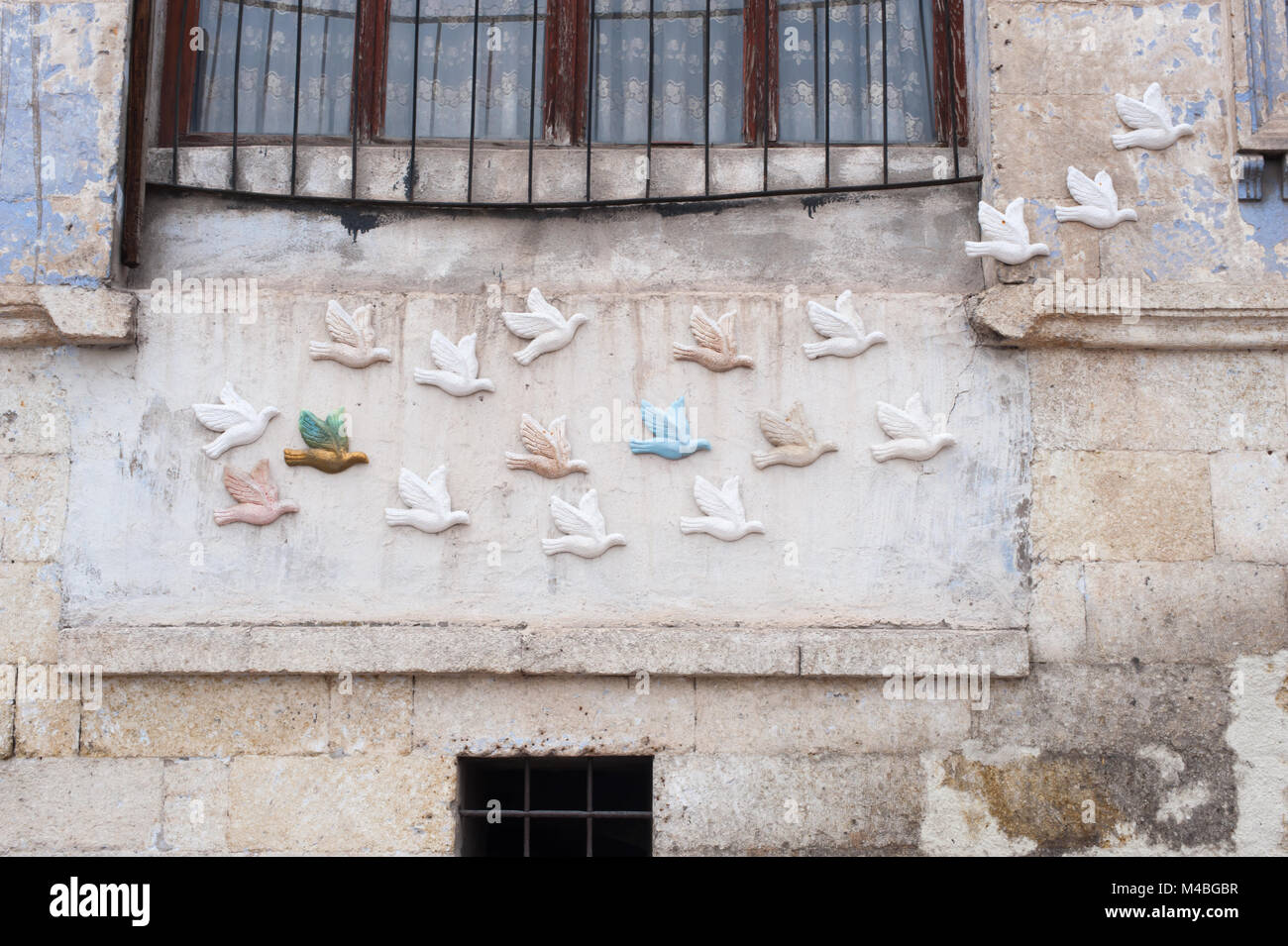 Birds decorate the outside of a building in Turkey. Stock Photo