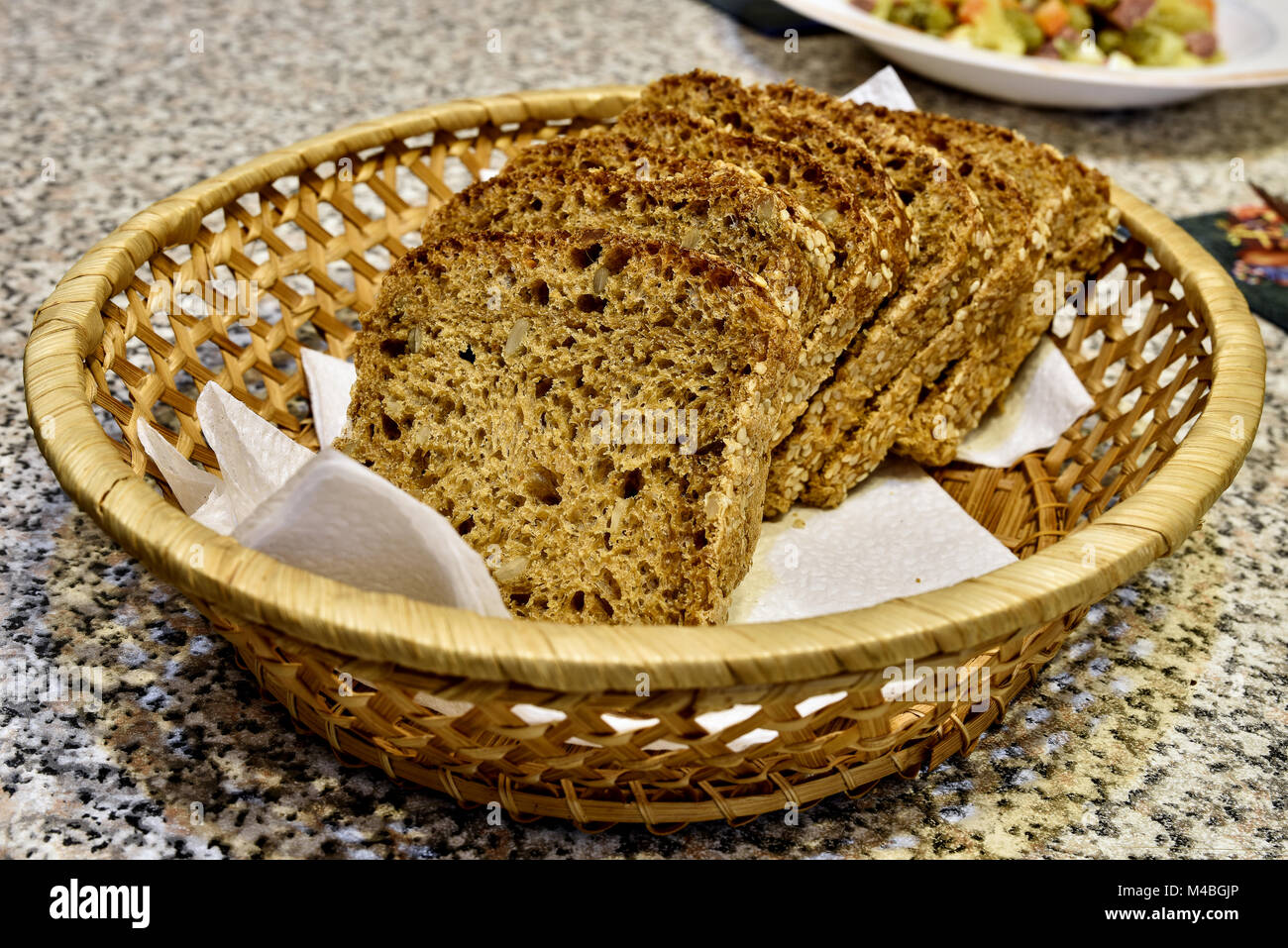 Wicker basket with slices of dietary bread Stock Photo