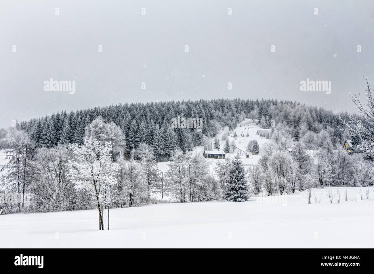 Landscape of snowy mountains in the highlands Stock Photo