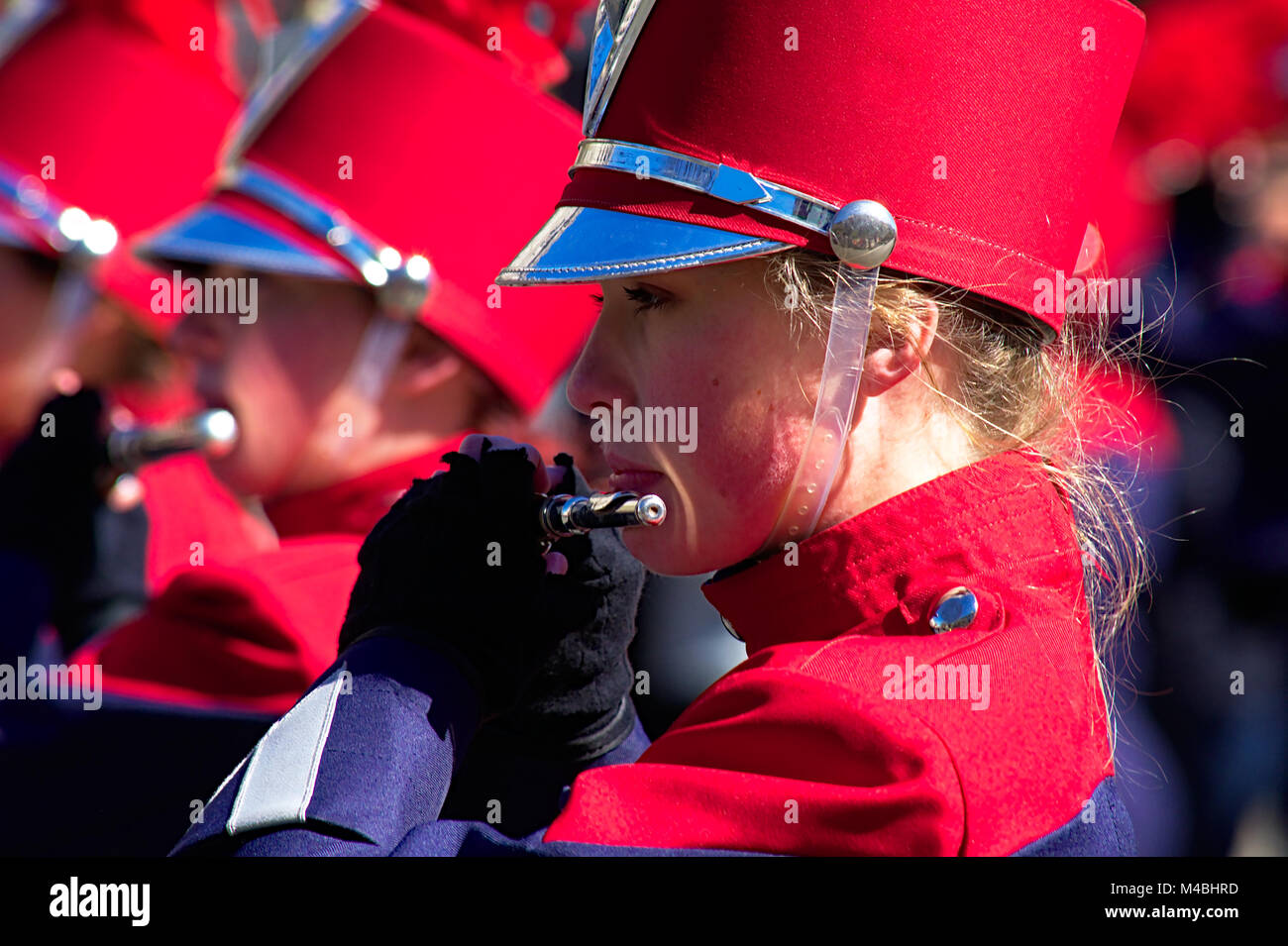 High School marching band during Cherry Blossom Parade in Washington DC closeup female planning flute Stock Photo