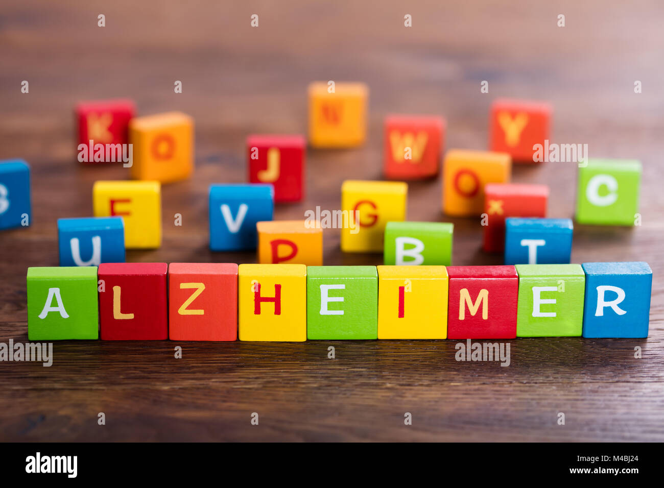 Alzheimer Text On Colorful Wooden Blocks On Table Stock Photo