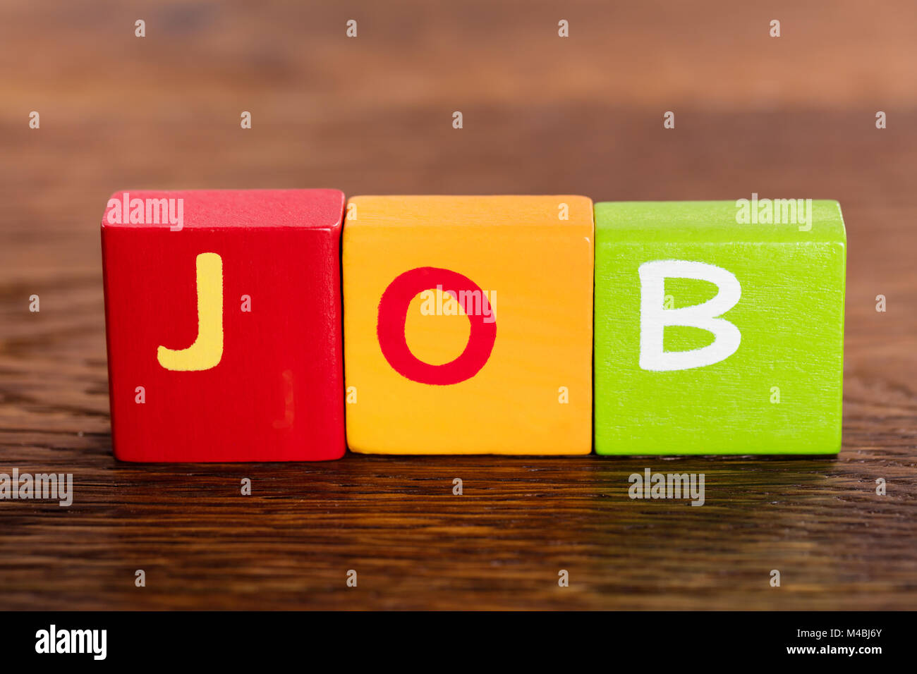 Job Word Made With Building Colorful Blocks On Wooden Table Stock Photo