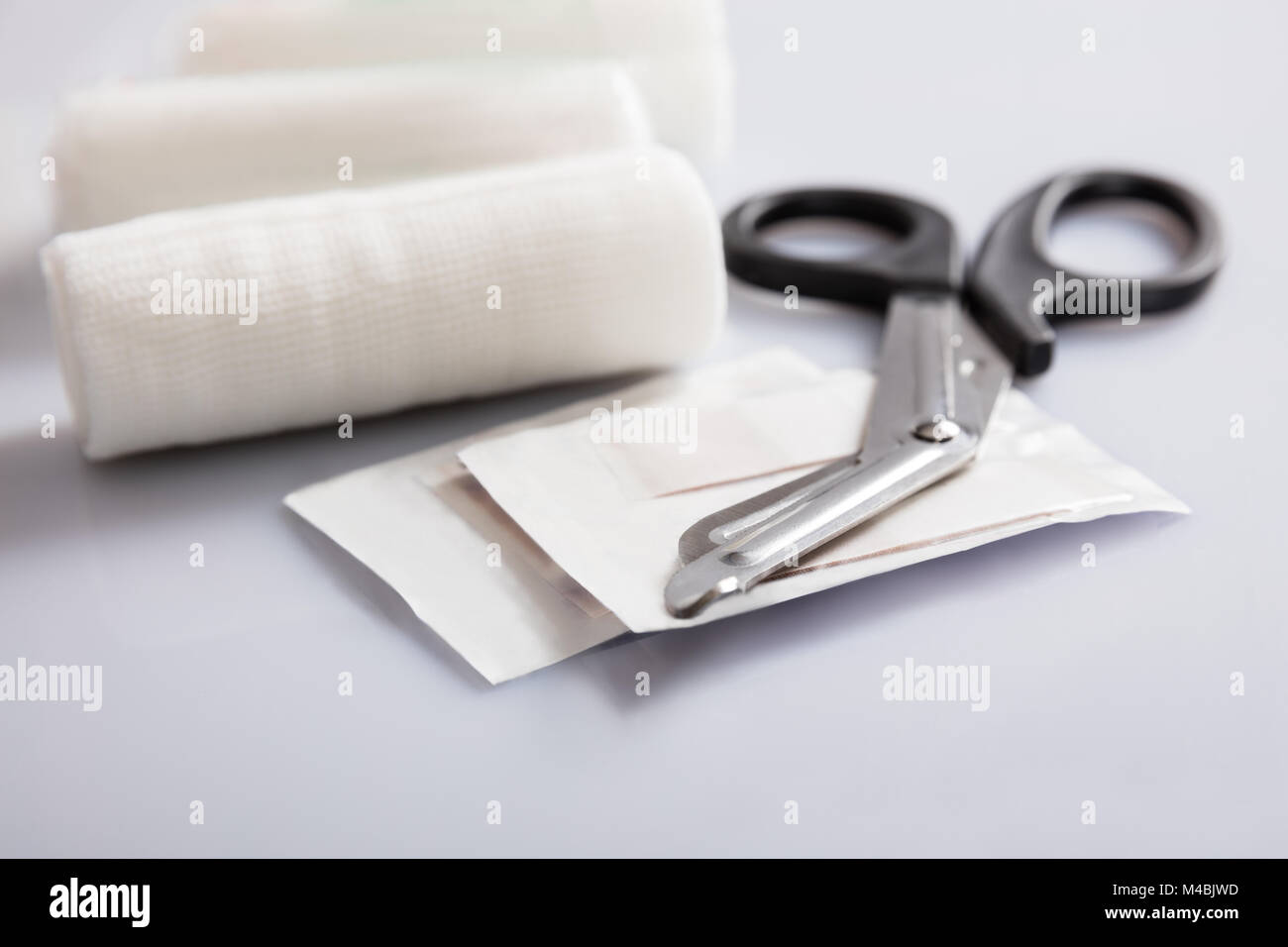 Closeup Of Medical Bandage Rolls And Scissor Stock Photo Alamy