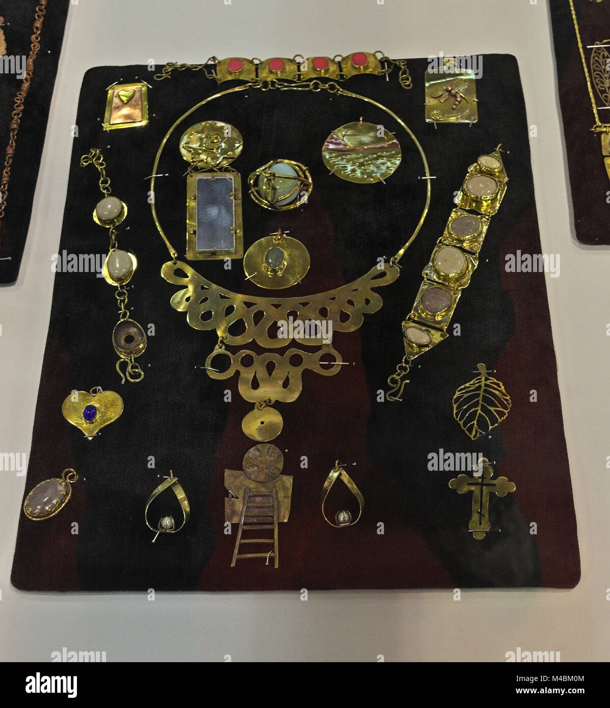 Replicas of antique jewelry displayed on exhibition expo Stock Photo