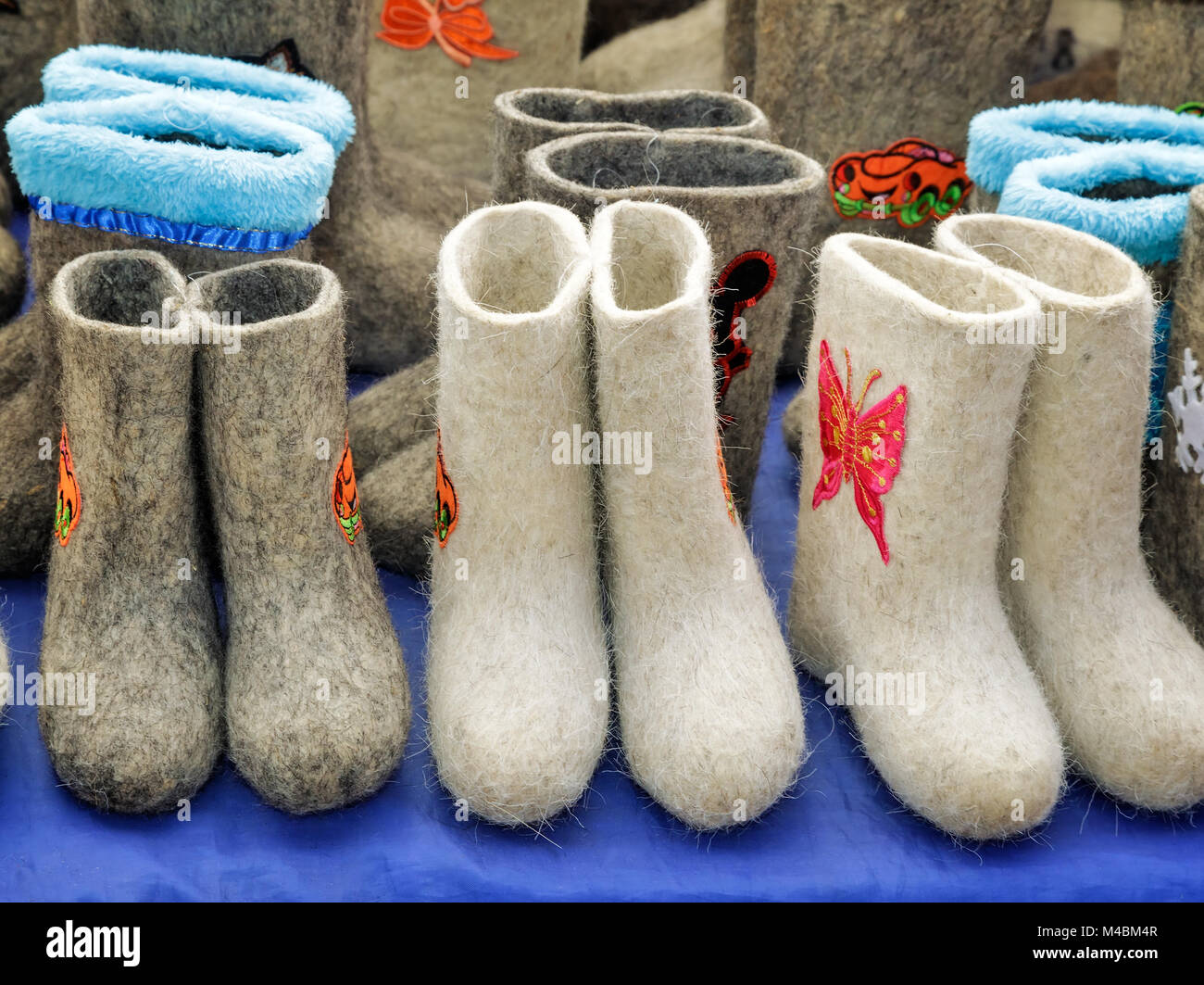 Warm shoes for children made of felt (boots) Stock Photo