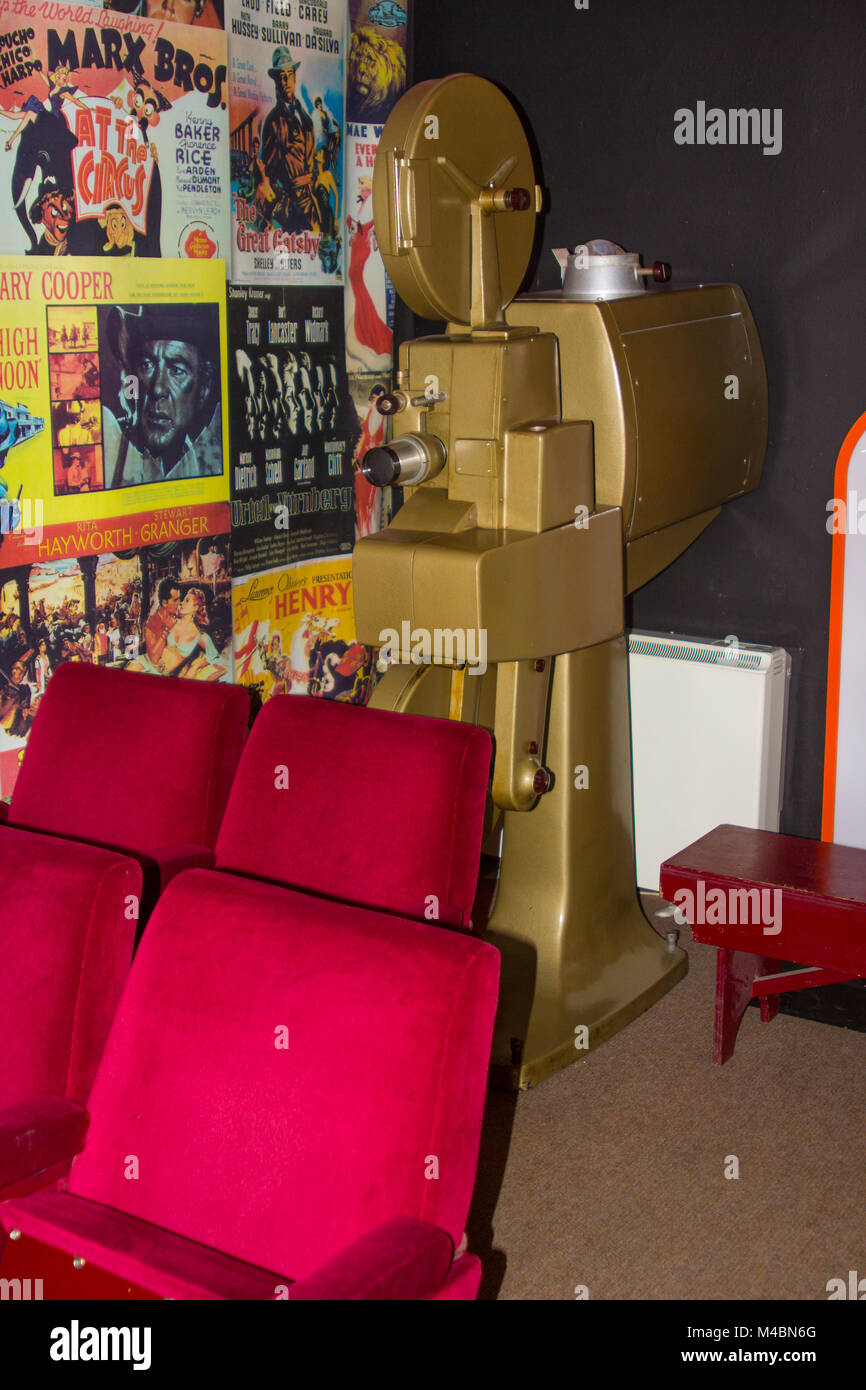 A very old free standing cinema film projector with its heavy casing in a small museum cinema at the Bangor Castle Heritage Centre in Bangor County D Stock Photo