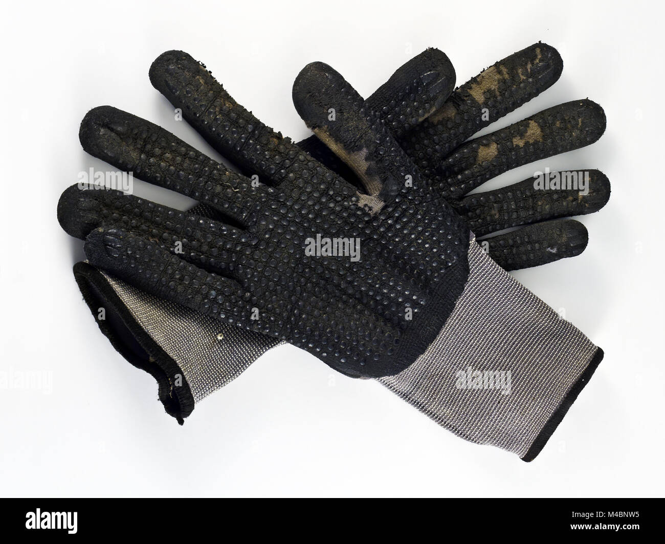 old black work gloves with polka dots Stock Photo