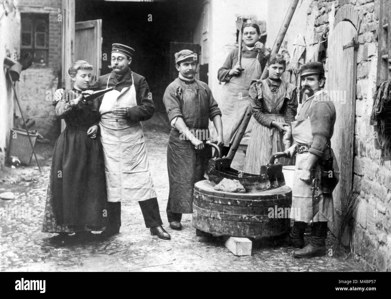 Agriculture,butchers celebrate in the yard,1900s,exact place unknown ...