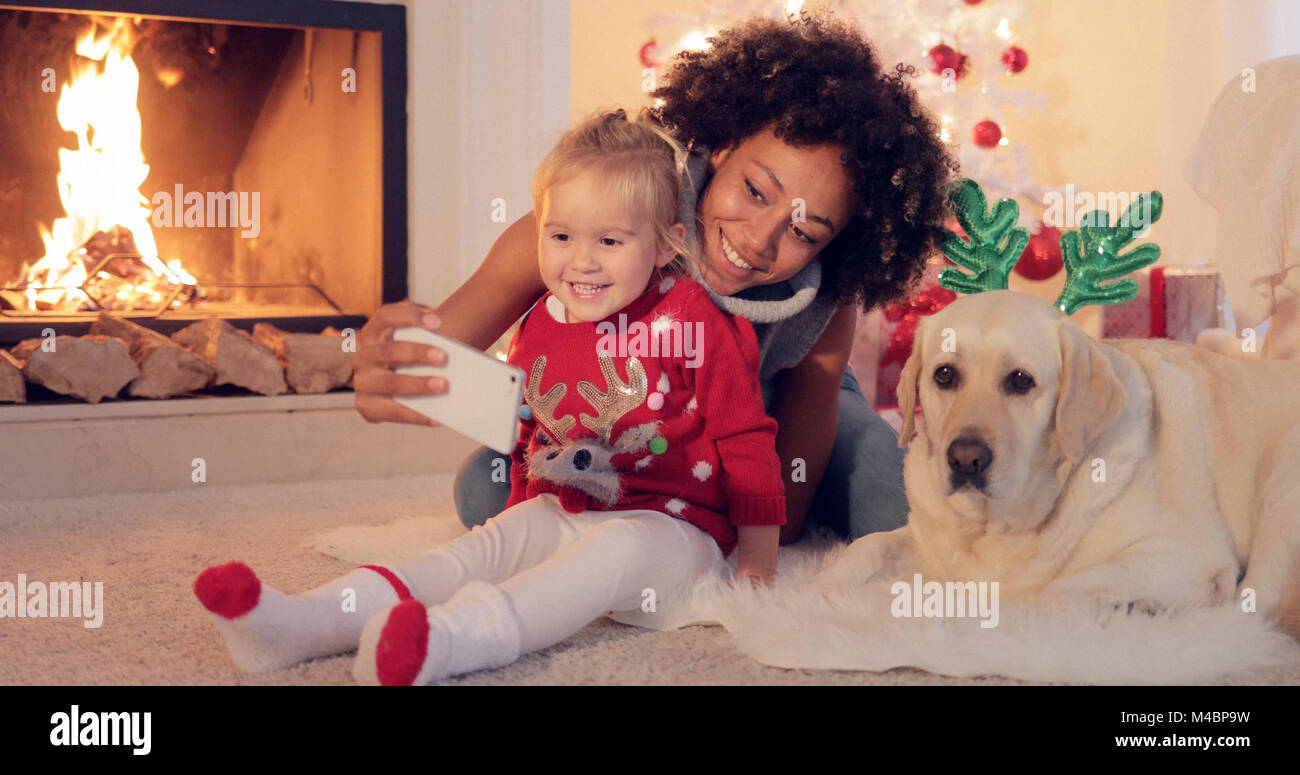 Happy family selfie portrait at Christmas Stock Photo