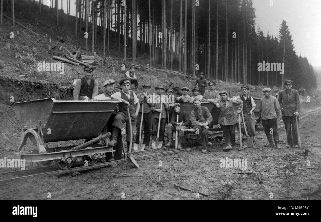 Group picture,workers in the forest,1920s,exact location unknown,Germany Stock Photo