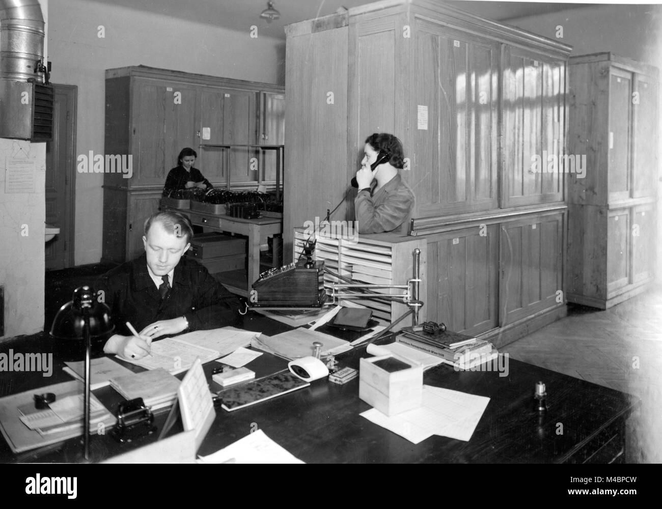 Office Man At The Desk Secretary On The Phone 1940s Exact Location
