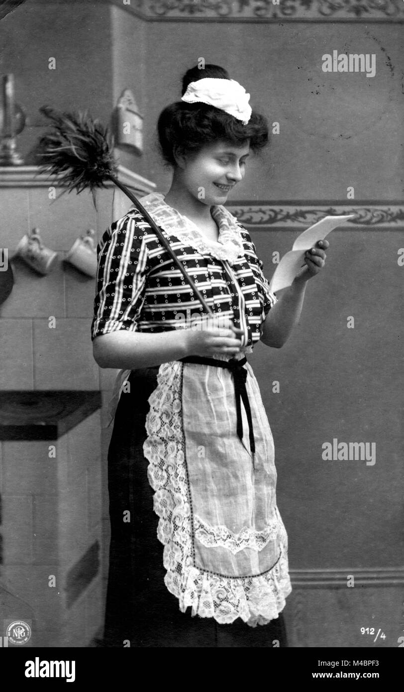 Charwoman with love letter,1910s,exact place unknown,Germany Stock Photo
