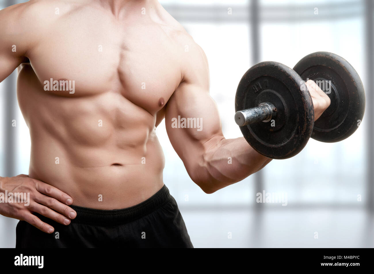 Standing Bicep Dumbbell Curl Stock Photo