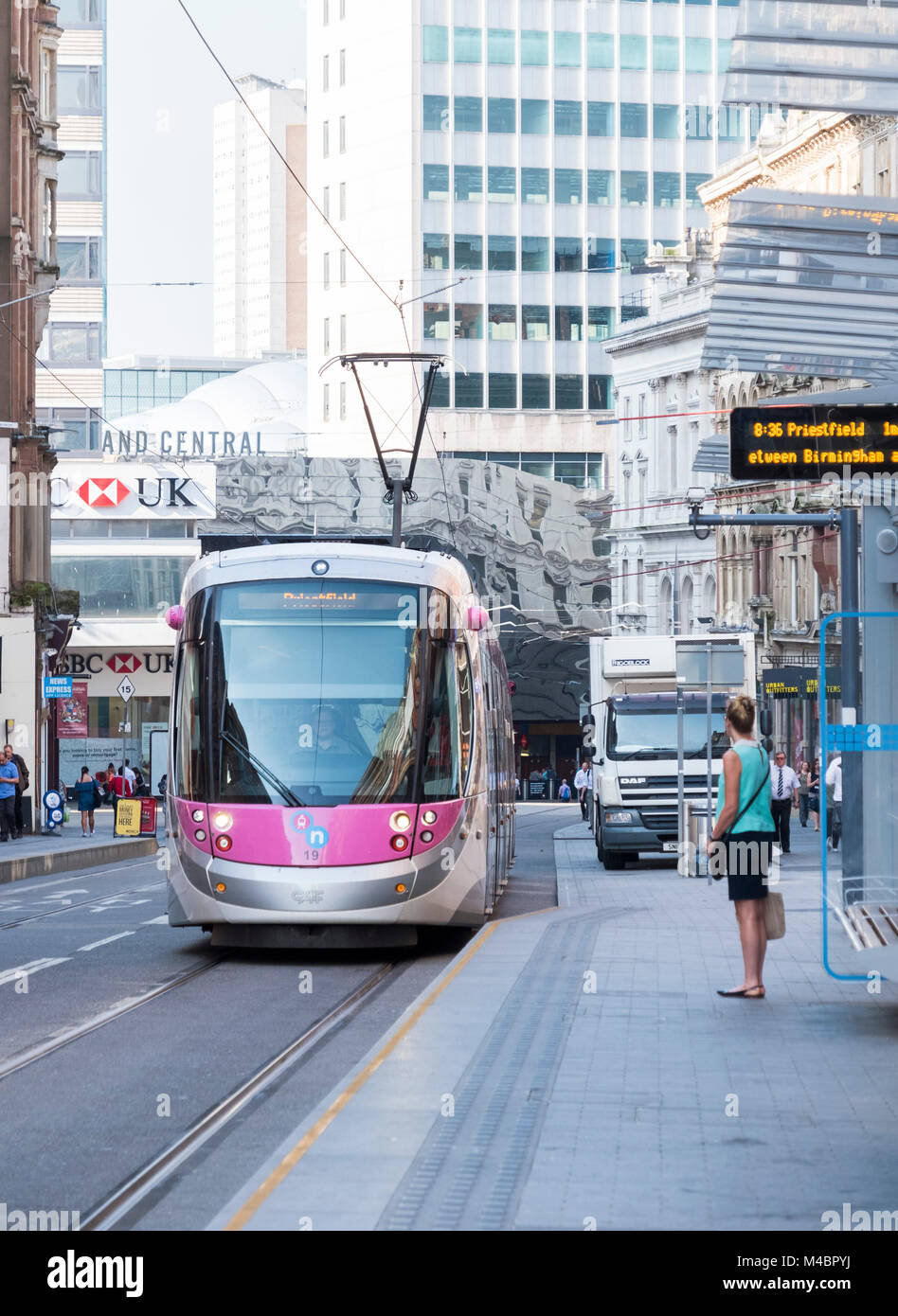 An electric tram in Birmingham City Centre, England Stock Photo