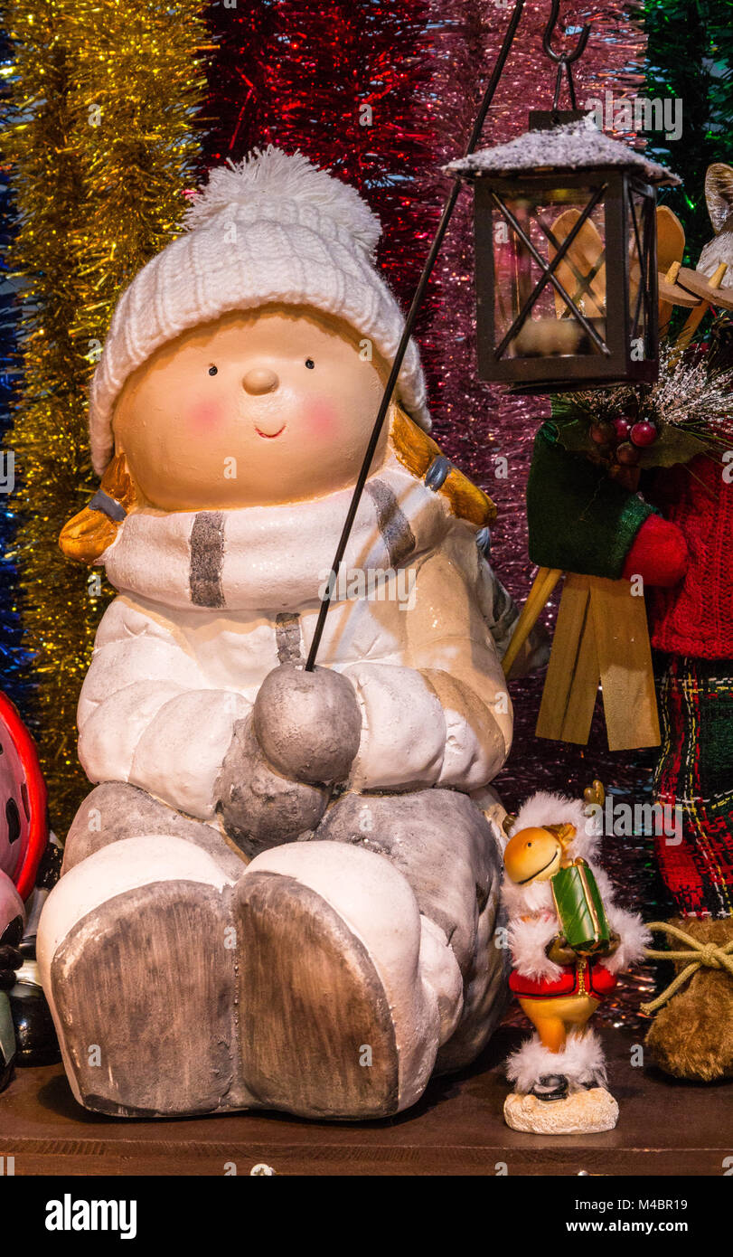 Christmas doll ornament with hat and scarf  Winter Wonderland,Christkindmarkt, Rathausplatz, Vienna, Austria, Europe Stock Photo
