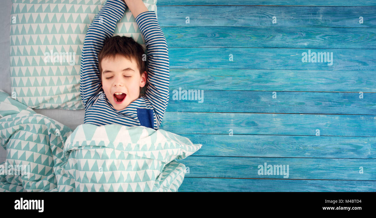 eight years old child sleeping in bed on pillow Stock Photo Alamy
