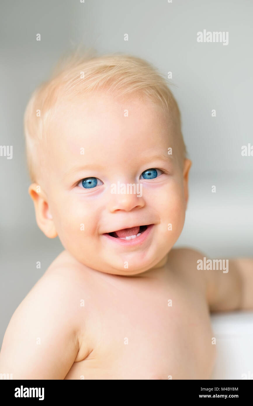 Baby boy with blue eyes Stock Photo Alamy