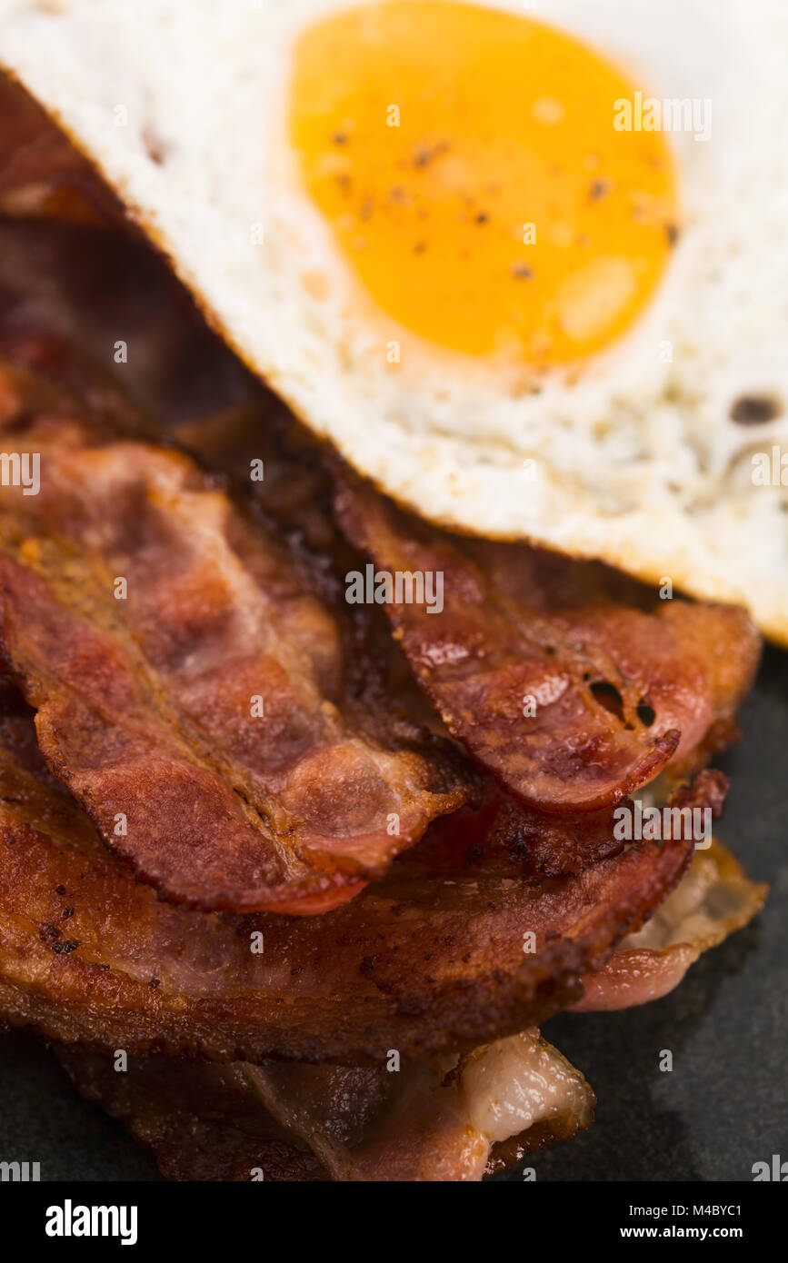Fried Egg And Bacon Rashers Stock Photo Alamy