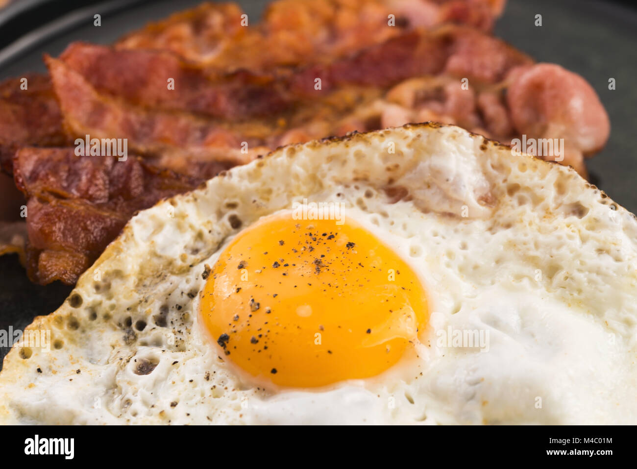Fried Egg And Bacon Rashers Stock Photo Alamy
