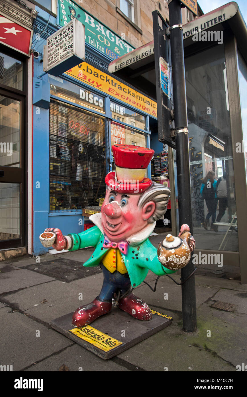 The Mad Hatter outside Backtracks secondhand store on Brougham Street in Edinburgh, Scotland, UK