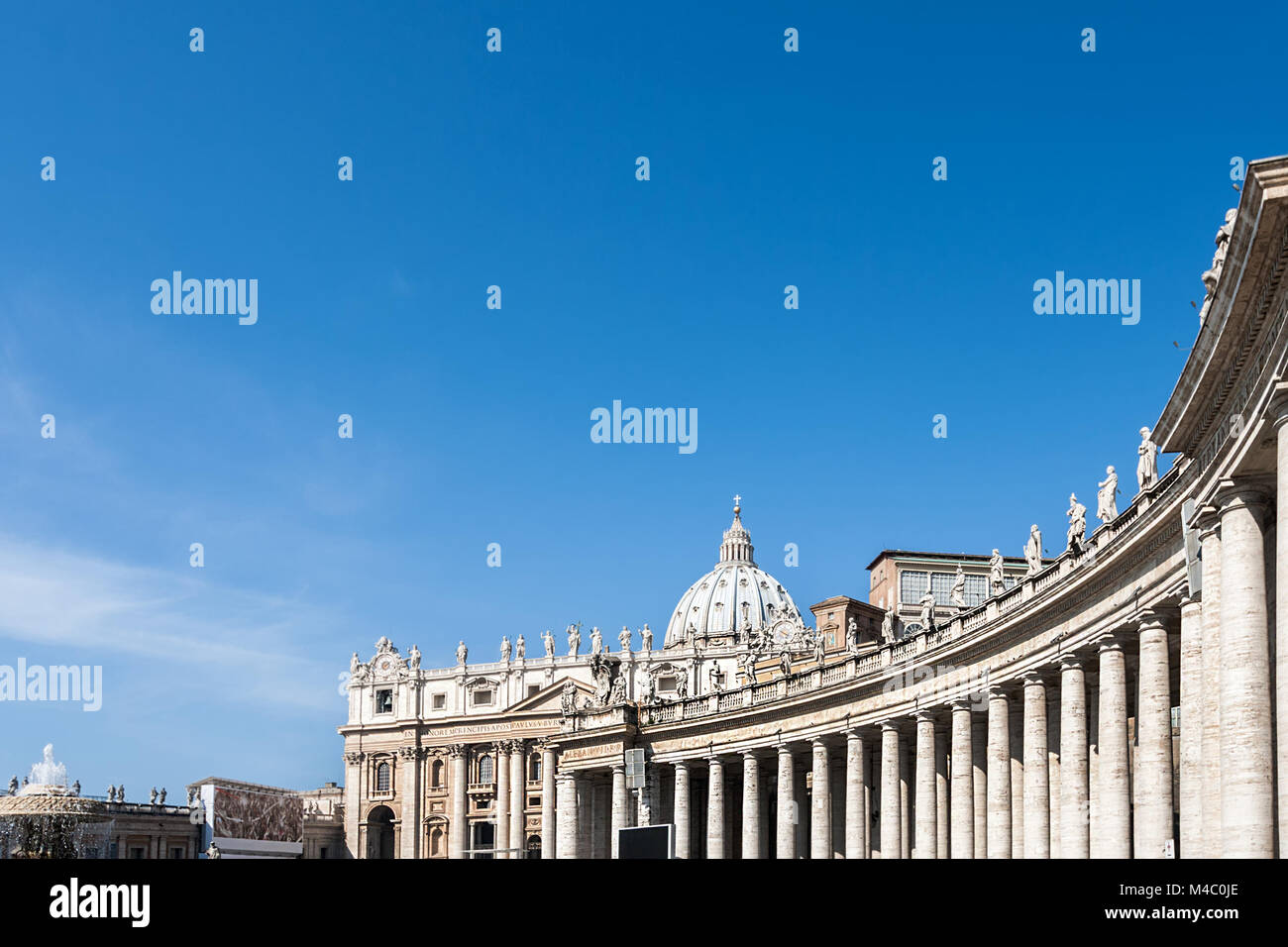 Bernini's colonnades and Saint Peter's Stock Photo
