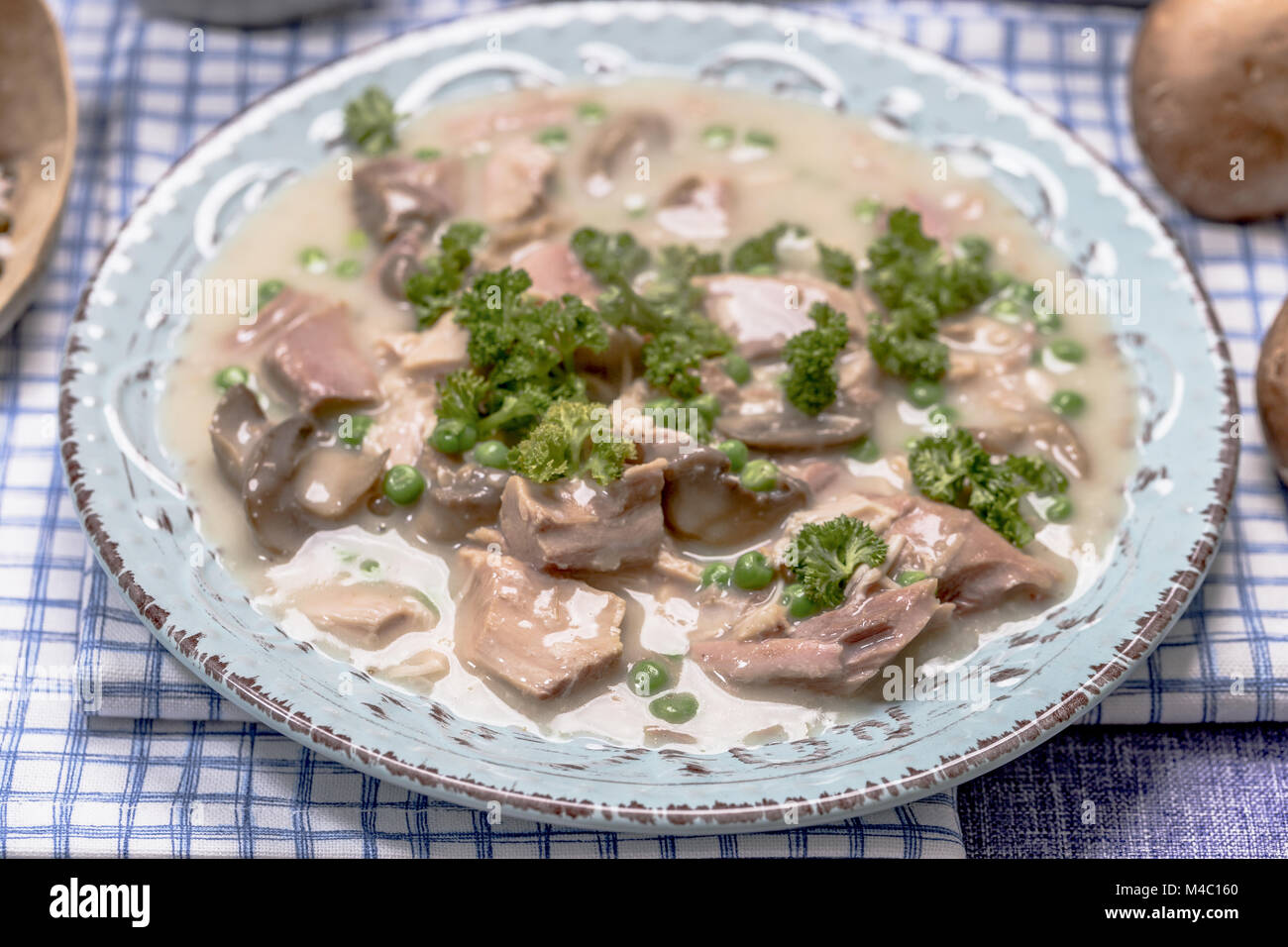 Chicken Fricassee with Mushrooms and Peas Stock Photo Alamy