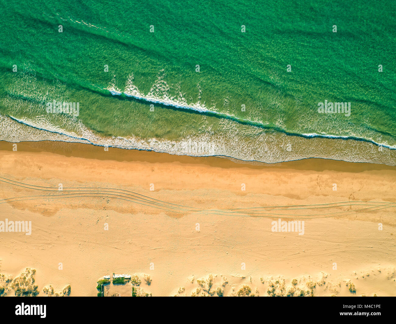 Aerial View Amazing Seascape with Small Waves on Sandy Beach Stock Photo