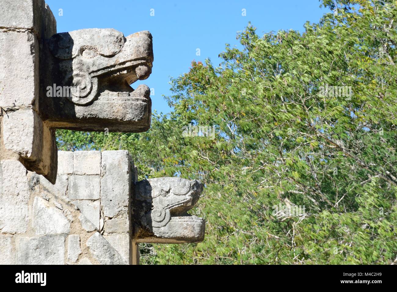 Animal statues in wall  Chichen Itza Stock Photo