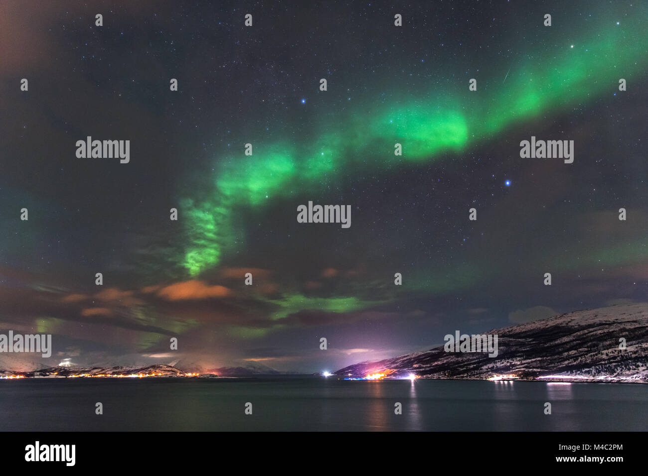Northern lights above ocean in Leirbotn Kviby, Northern Norway, Finnmark, Alta, nordlyssafari, nordlys alta, northernlights alta, Kviby, Altafjord, Stock Photo