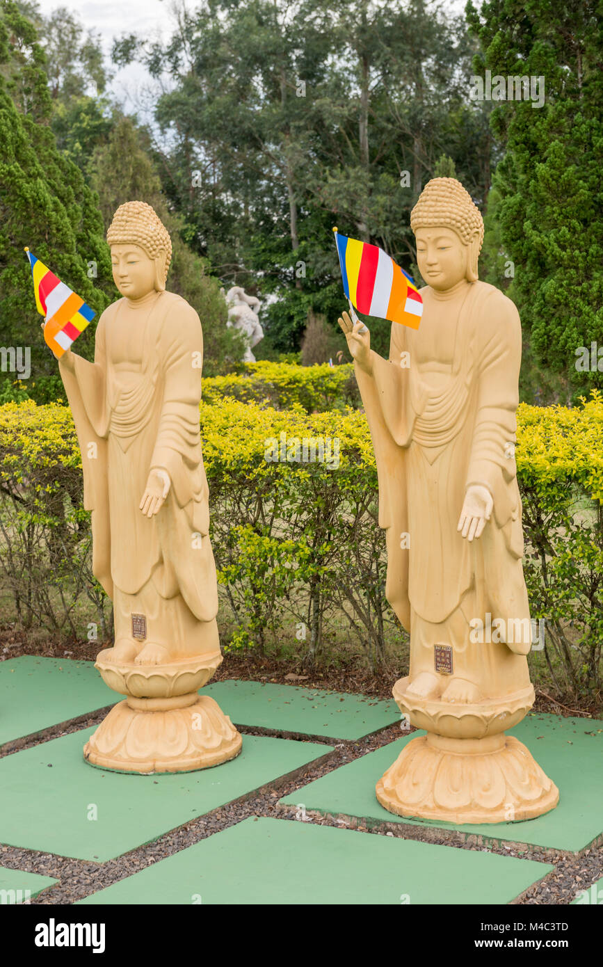 Many Buddha statues in perspective at the buddhist temple Stock Photo Alamy
