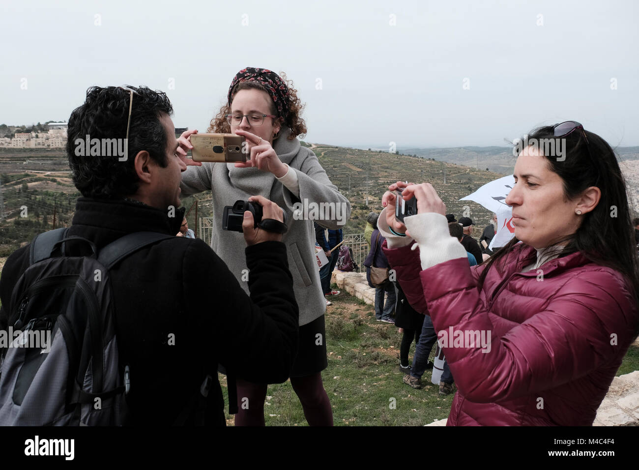 Nativ Ha'avot, Israel. 15th Feb, 2018. Female activists from the right wing Zionist organization Im Tirtzu confront a member of the left-wing Peace Now movement protesting next to the illegal outpost of Nativ Ha'avot on following Israeli government attempts to postpone the removal of some of the houses in the outpost despite the Supreme Court ruling after accepting the petition of a group of Palestinians who argued the homes had been partially built illegally on their land. Credit: Eddie Gerald/Alamy Live News Stock Photo