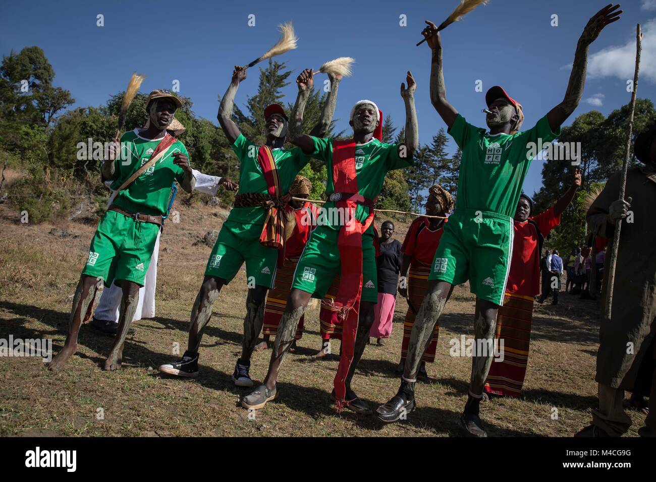 Uganda. 2nd Feb, 2018. Young men and women from the Sebei tribe in Kapchorwa, northeast Uganda, reenact the ceremony they'd go through before circumcision or female genital mutilation (FGM). Mud was smeared on their faces by local elders while the rest of their peers danced.Female genital mutilation (FGM) has been outlawed in Uganda since 2010, but aid workers and police say it's still being practiced by tribes in the northeast, including the Pokots, Sebei, Tepeth and Kadama. Credit: Sally Hayden/SOPA/ZUMA Wire/Alamy Live News Stock Photo