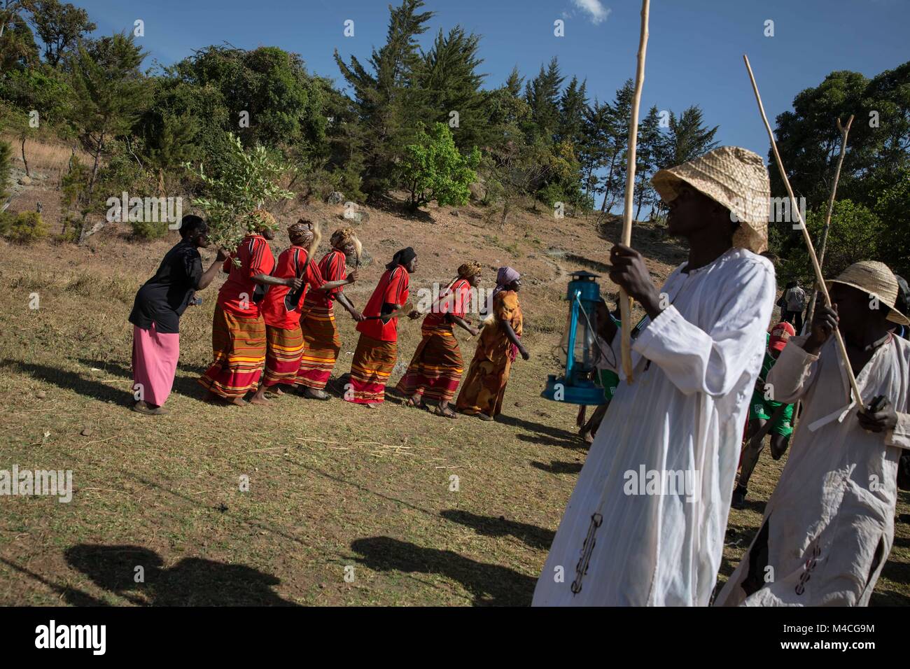Uganda. 2nd Feb, 2018. Young men and women from the Sebei tribe in Kapchorwa, northeast Uganda, reenact the ceremony they'd go through before circumcision or female genital mutilation (FGM). Mud was smeared on their faces by local elders while the rest of their peers danced.Female genital mutilation (FGM) has been outlawed in Uganda since 2010, but aid workers and police say it's still being practiced by tribes in the northeast, including the Pokots, Sebei, Tepeth and Kadama. Credit: Sally Hayden/SOPA/ZUMA Wire/Alamy Live News Stock Photo
