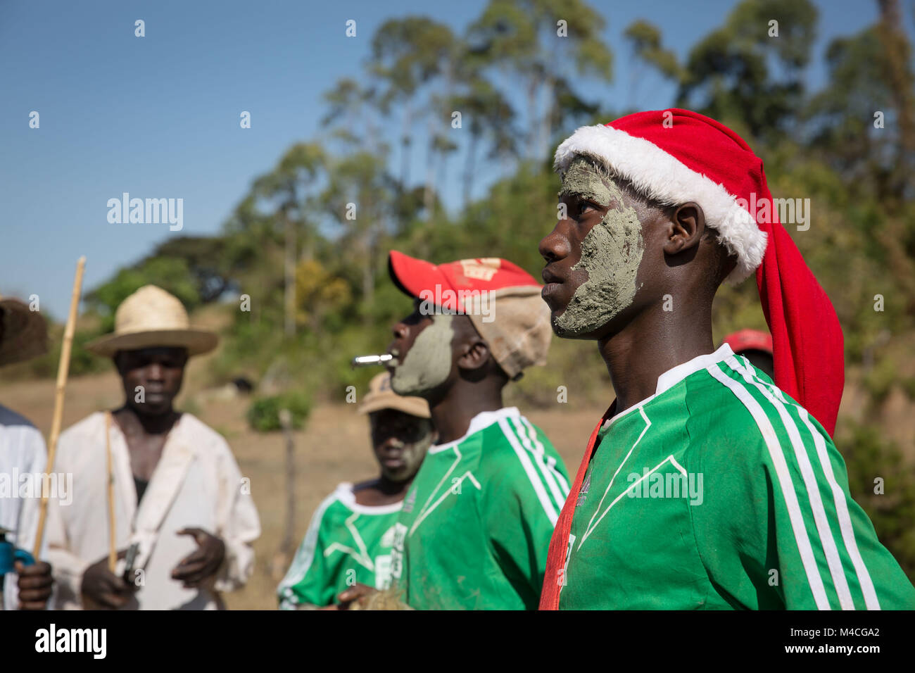 Uganda. 2nd Feb, 2018. Young men from the Sebei tribe in Kapchorwa, northeast Uganda, reenact the ceremony they'd go through before circumcision. Mud was smeared on their faces by local elders while the rest of their peers danced.Female genital mutilation (FGM) has been outlawed in Uganda since 2010, but aid workers and police say it's still being practiced by tribes in the northeast, including the Pokots, Sebei, Tepeth and Kadama. Credit: Sally Hayden/SOPA/ZUMA Wire/Alamy Live News Stock Photo